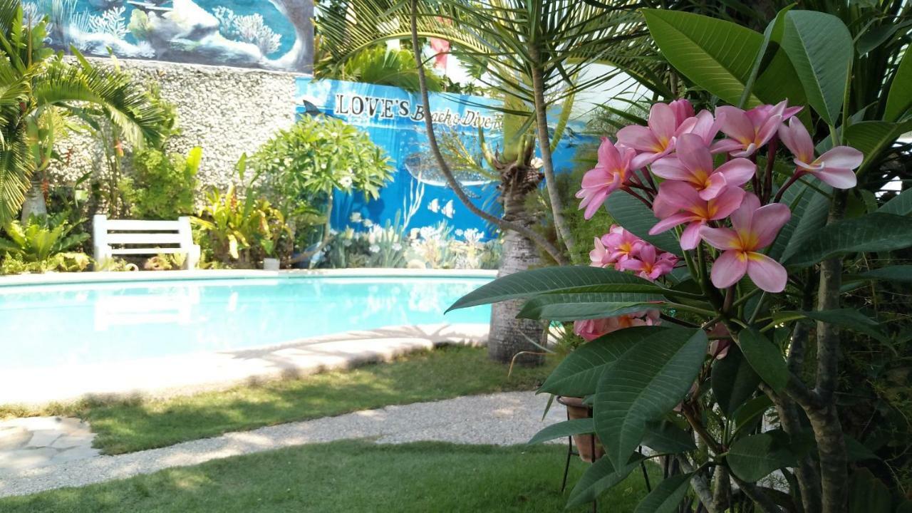 Love'S Beach & Dive Resort Moalboal Buitenkant foto